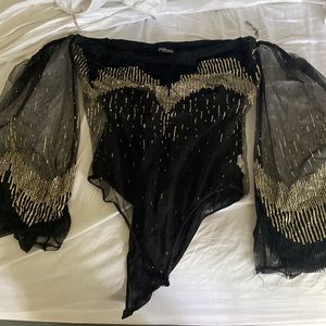 Black and gold bodysuit